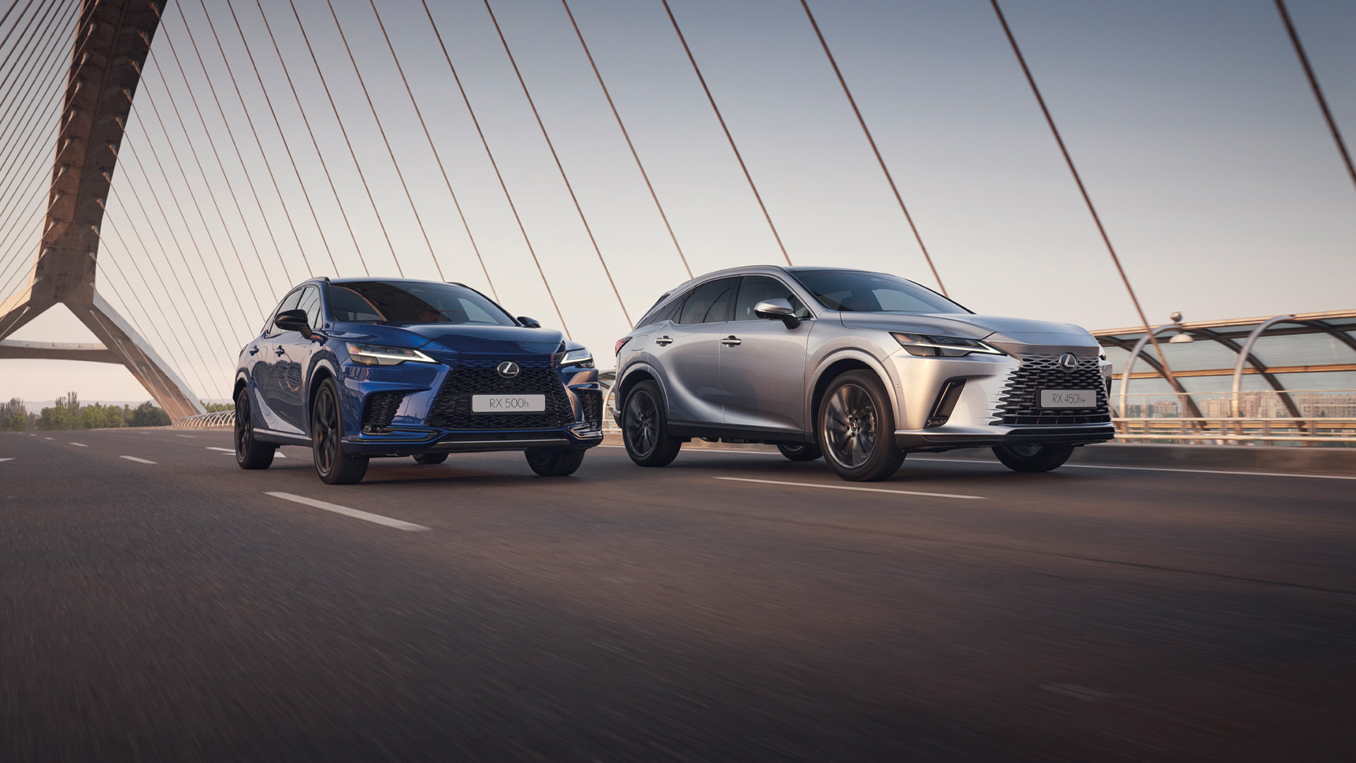 The Lexus RX 500h alongside the RX 450h+ plug-in hybrid.