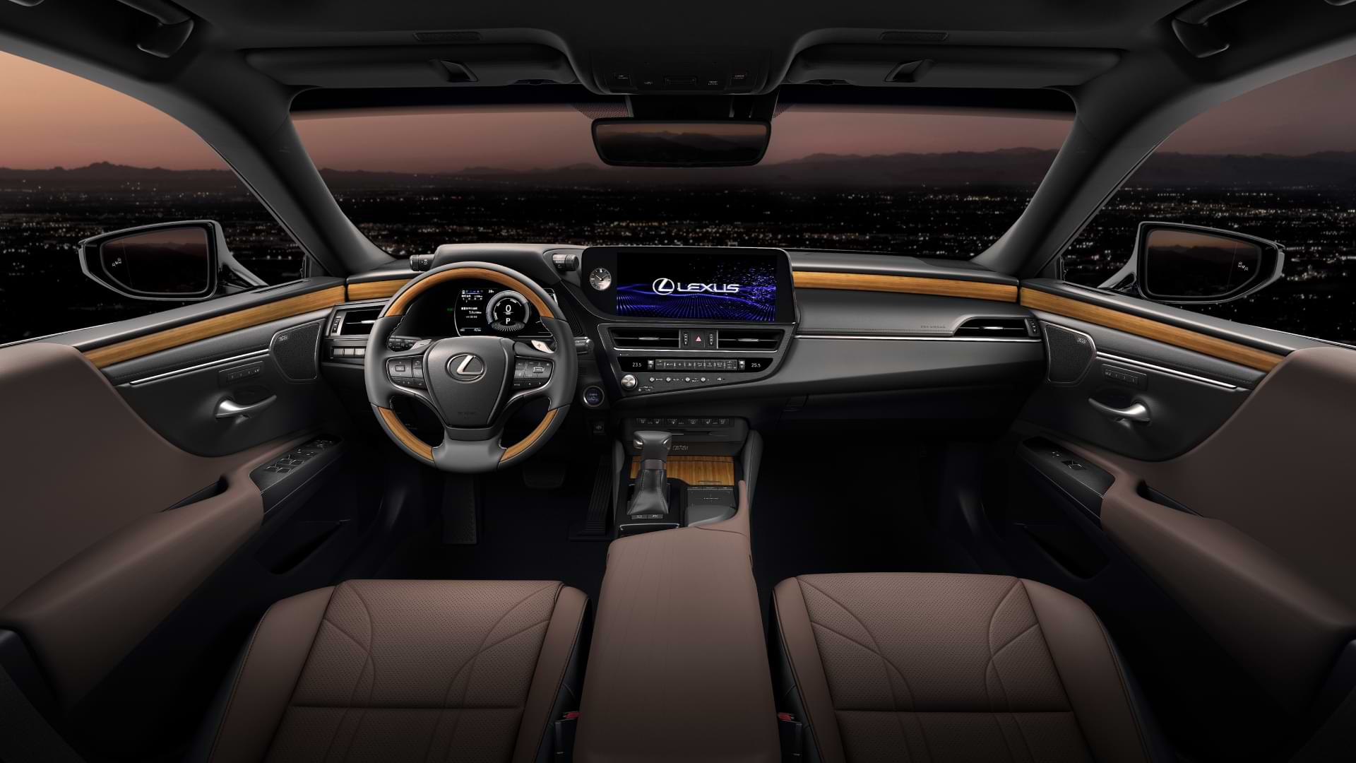 Interior view of 2021 Lexus ES steering wheel, dash and front seats. 